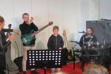 Kytary.cz - hudební worksop v Modřanech